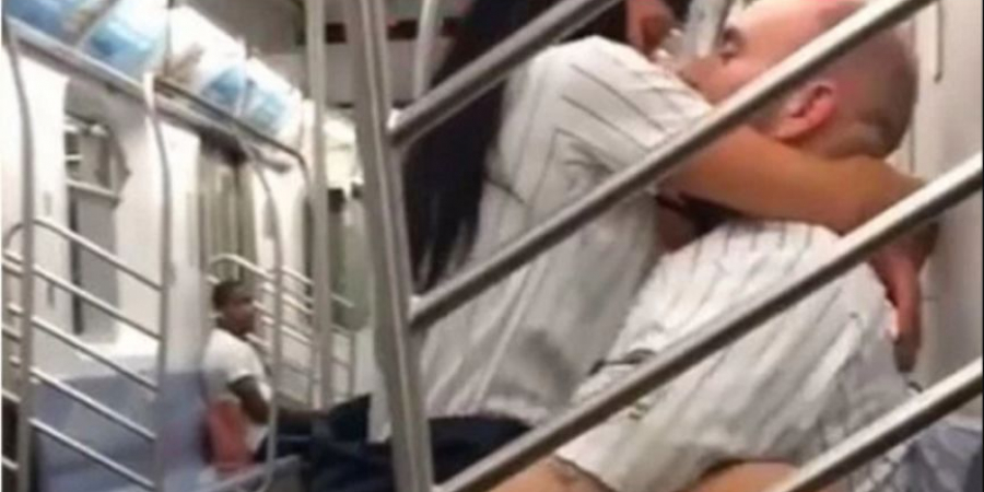 Two baseball fans go at it during train ride home