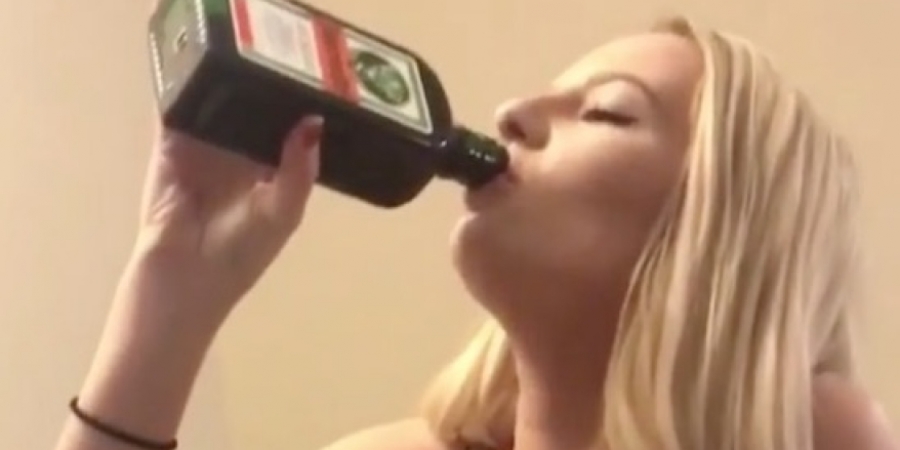 Hot girl chugs entire bottle of Jager!