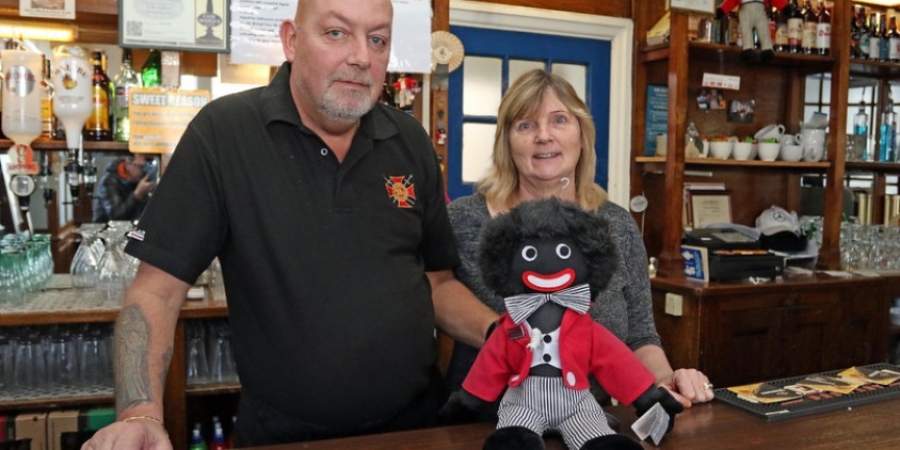 Pub landlord refuses to remove golliwog dolls despite complaints