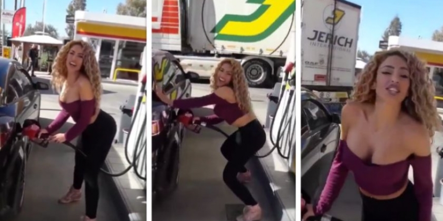 Hot Latina babe busts out slightly cringe dance moves while pumping gas!