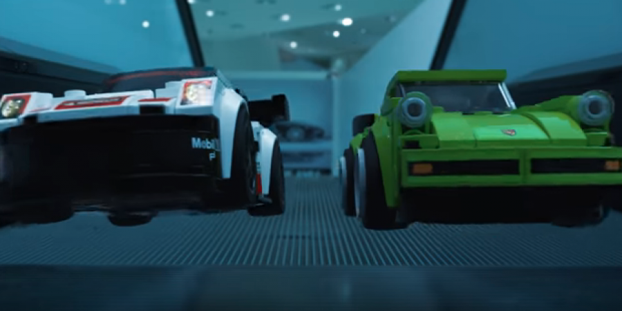 LEGO men race LEGO Porsches at the Porsche museum