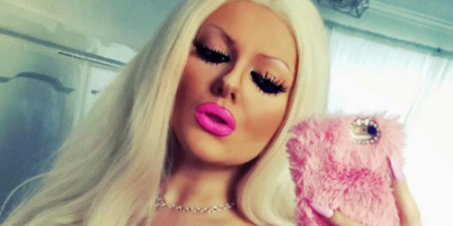Meet the self-confessed Barbie doll who has spent £7k on her humongous tits
