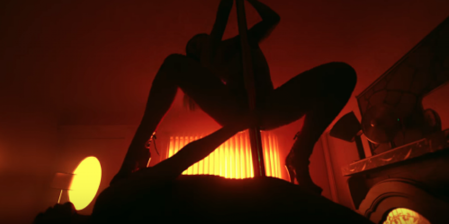 Iggy Azalea works the strip club pole in latest music video