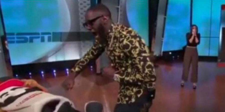 Deontay Wilder has apologised for breaking a mascot's jaw on live TV