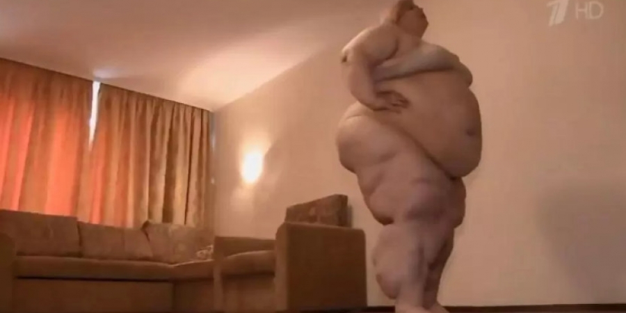 Neighbour of Russia's fattest women is worried her ceiling will cave in under the strain!