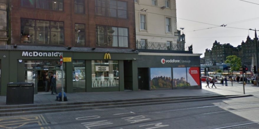 Dude flops his cock out whilst queuing for McDonald's breakfast