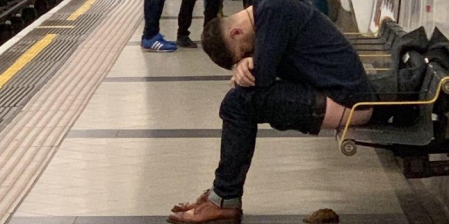 Wasted dude pulls down his pants & takes a shit on the London underground