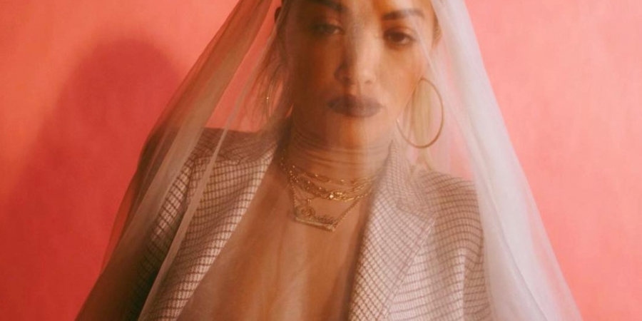 How boobs-out are these Rita Ora pics actually?