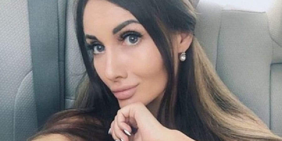Russian model protests police corruption by letting strangers grab her tits