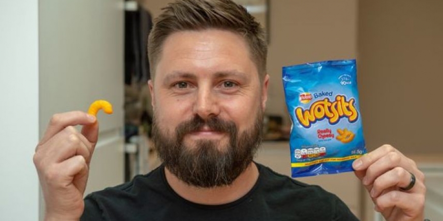 Dude cheesed off after finding only one wotsit in his bag of crisps