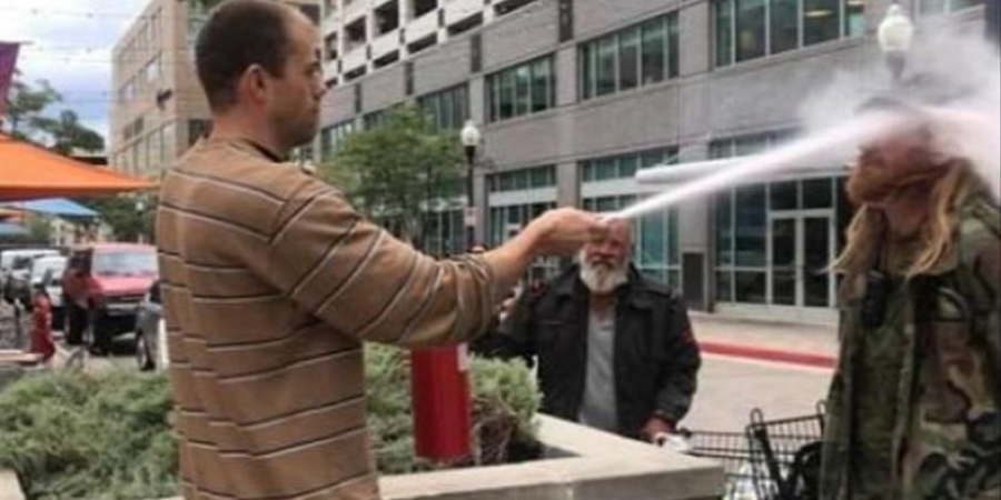 Restaurant owner blasts guy with fire extinguisher after he failed to stub out ciggy!