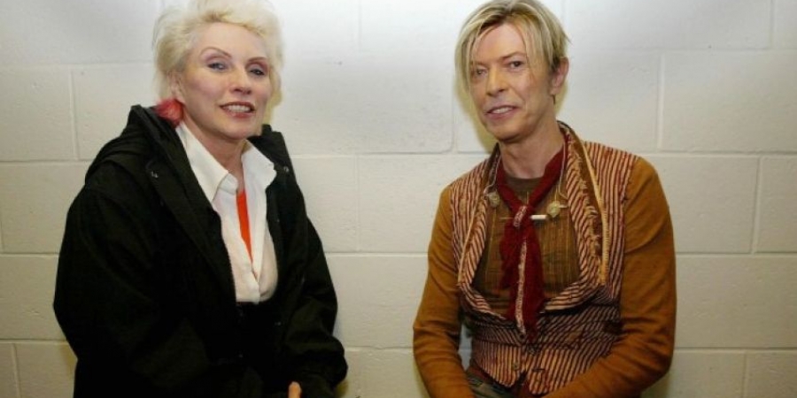Debbie Harry claims David Bowie flashed her his "notorious" penis as a reward for getting drugs
