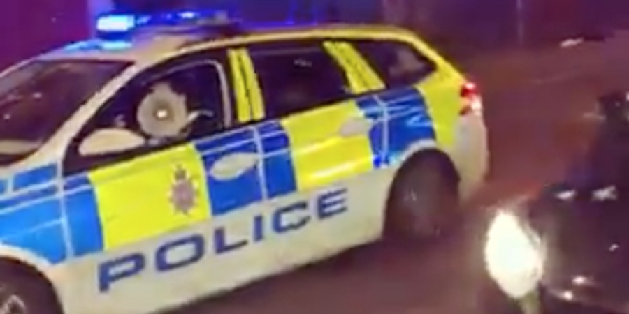 Police officer raps at people to stay inside in proper cringe video