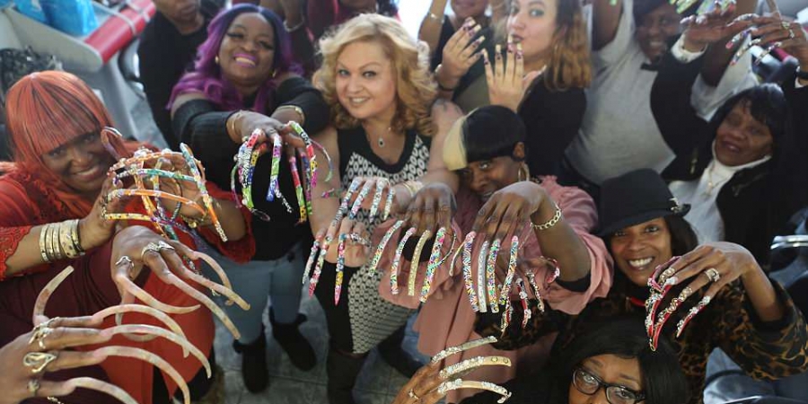 Meet the 'long nail goddesses' who love their 9 inch talons
