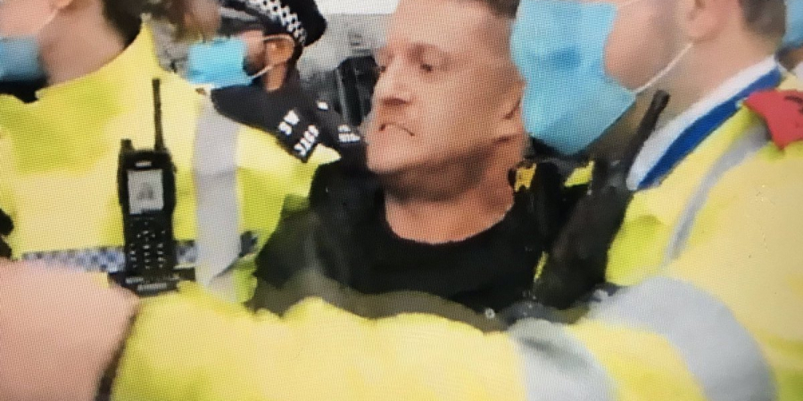 People yell ‘suck your mum’ as Tommy Robinson is led away by police