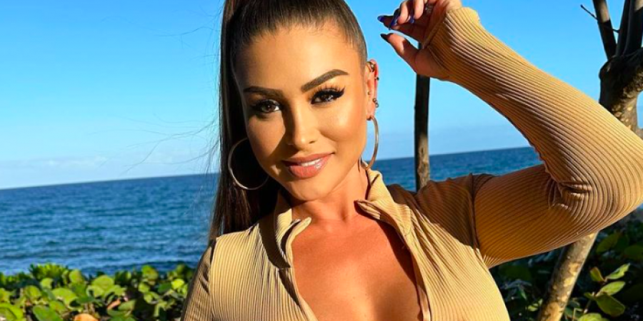 Playboy model flaunts camel toe in figure-hugging playsuit